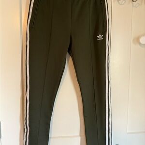 Adidas Women's Olive Joggers with White Stripes